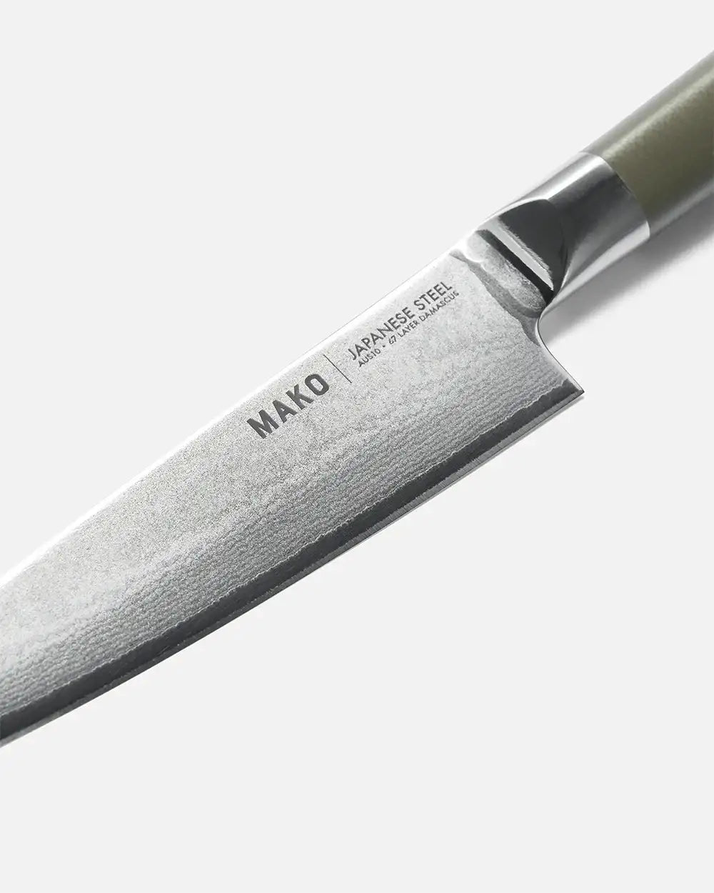 Close-up of Mako Japanese steel chef knife blade with 67-layer Damascus pattern and olive handle
