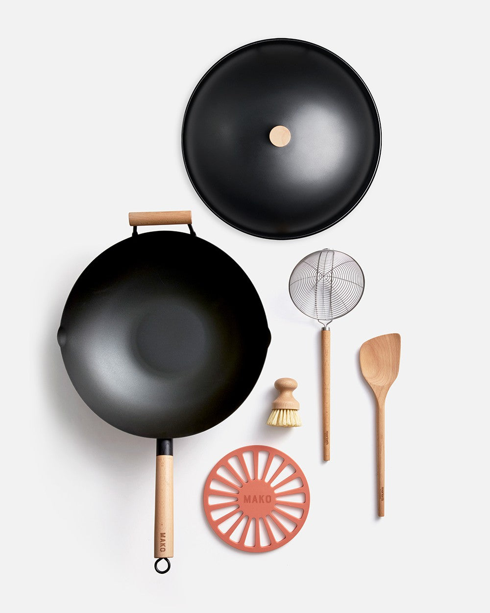 MAKO wok set by Marion Grasby with wooden handle, lid, spatula, skimmer, brush, and trivet