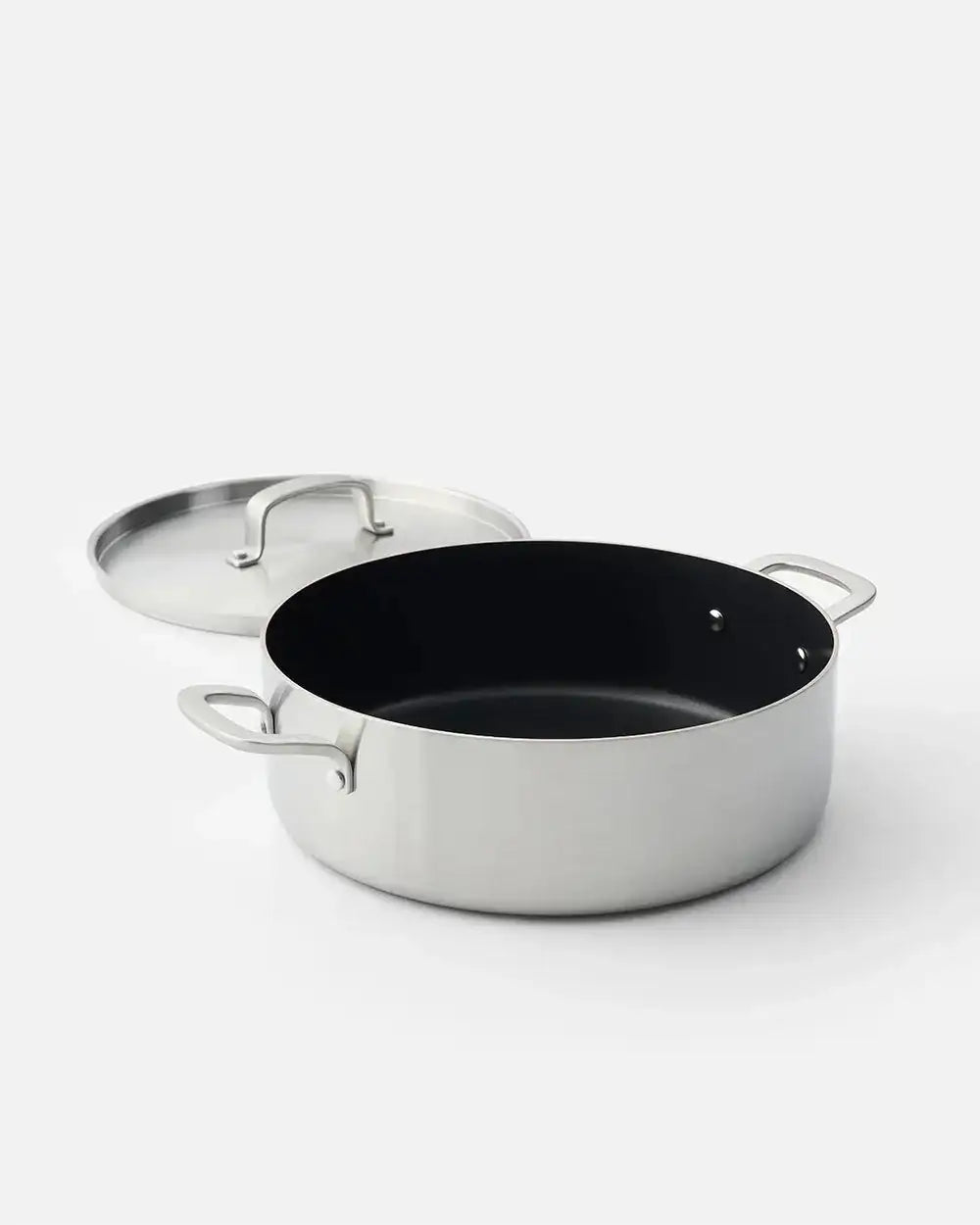 Stainless steel Mako nonstick pot with two handles and lid, designed by Marion Grasby