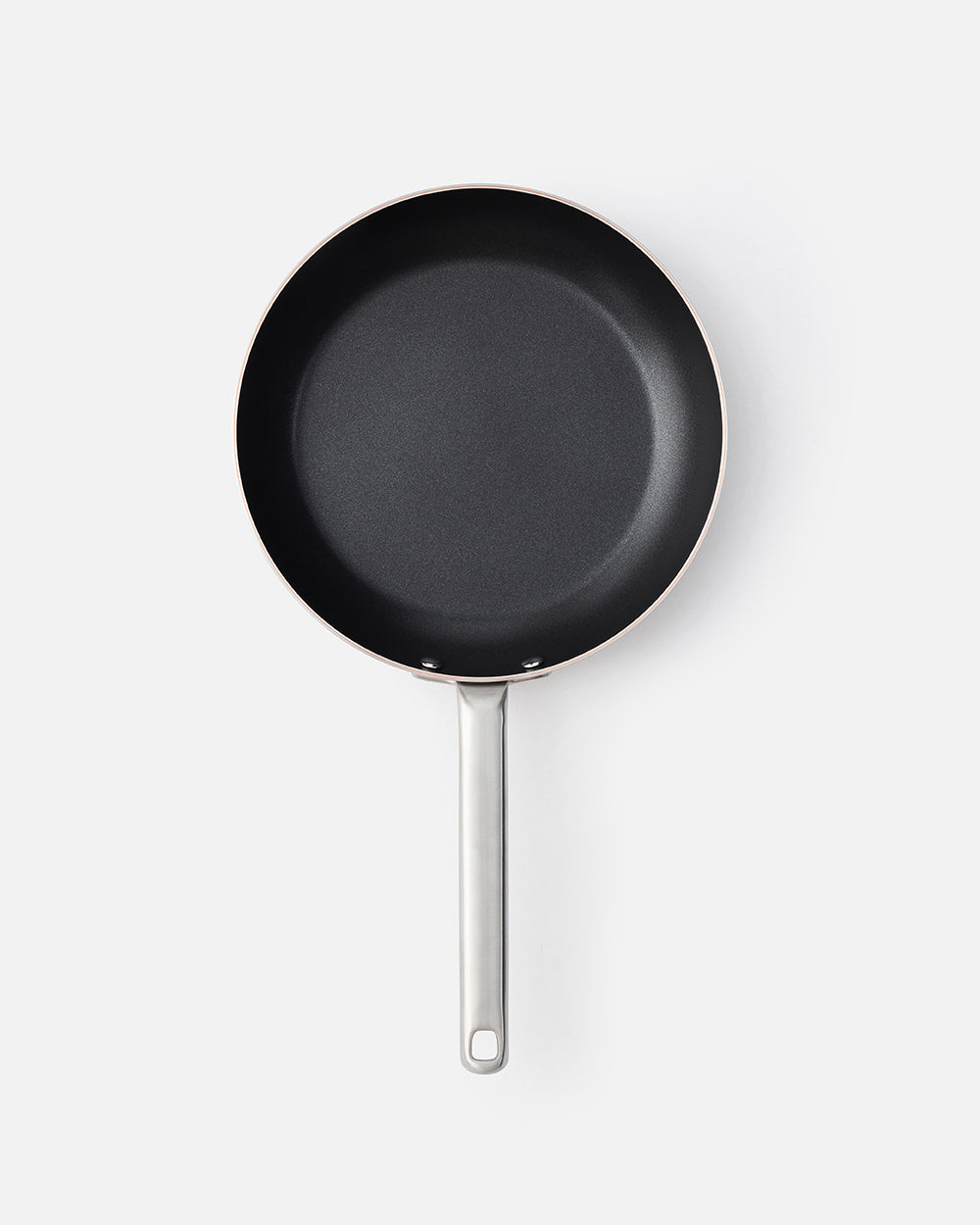 Non-stick frying pan with metal handle on white background, 25cm skillet for cooking