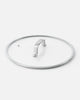 Stainless steel cooking lid with handle and vent hole on white background by Marion Grasby