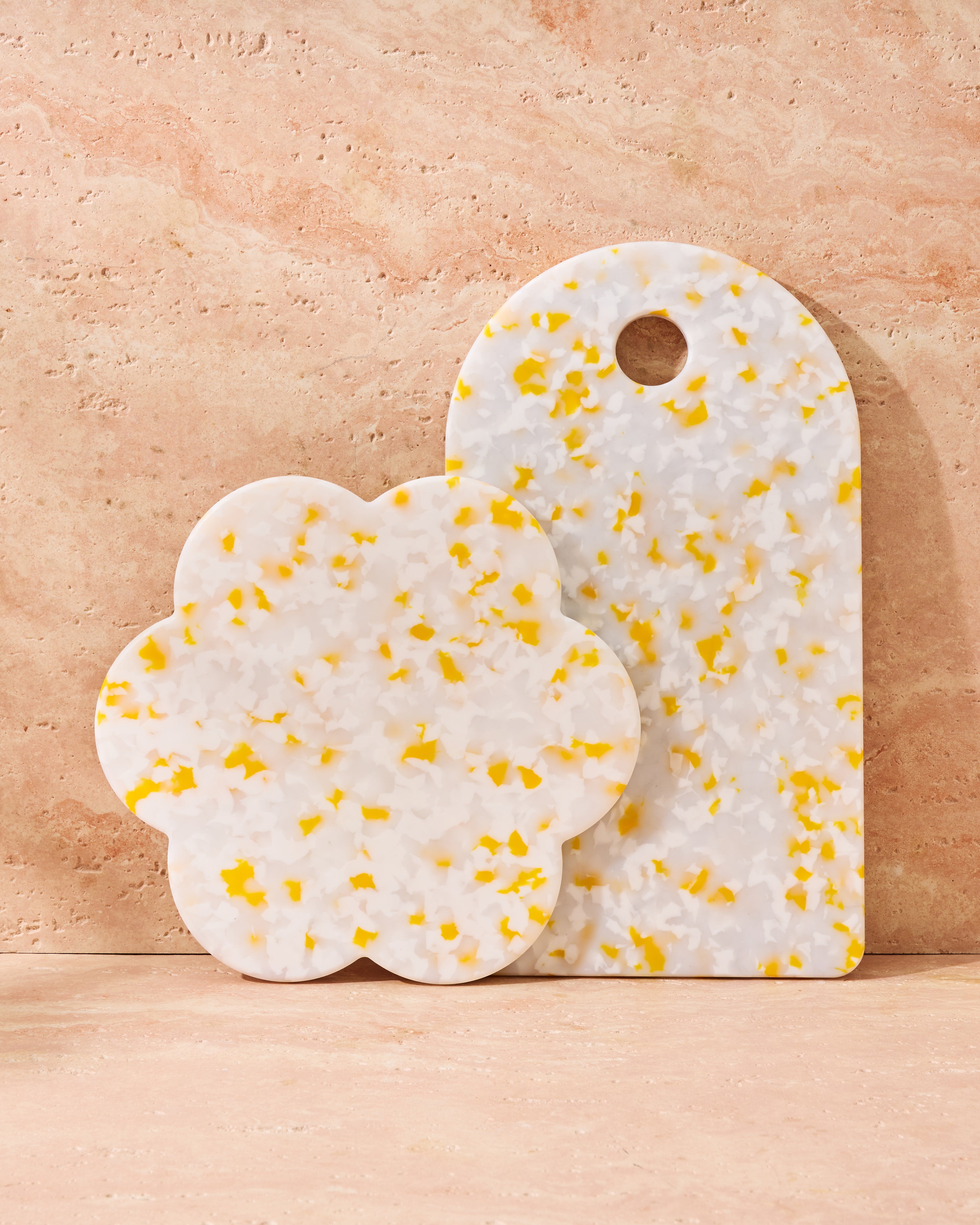 Sasni Lemon Meringue Duo bloom and arch board leaning against marble wall CookDineHost