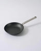 Black Mako non-stick frying pan with silver metal handle on white background