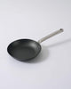 Black Mako non-stick frying pan with silver metal handle on white background