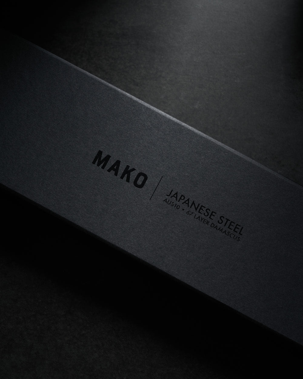 Black box with MAKO Japanese steel AUS10 67 layer Damascus text, Santoku knife packaging