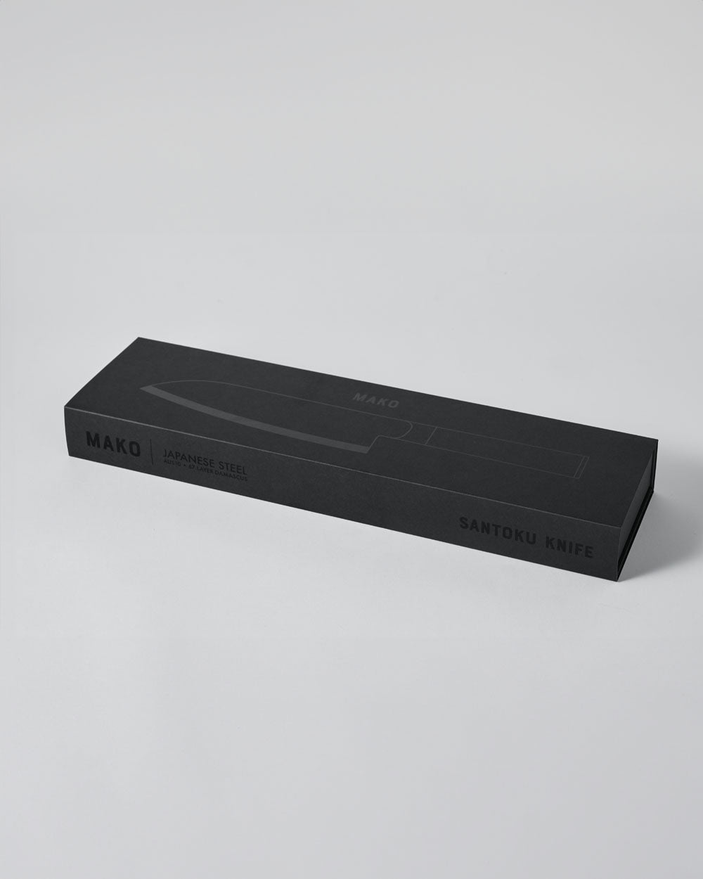 Black box packaging for Japanese steel 7-inch santoku kitchen knife on white background