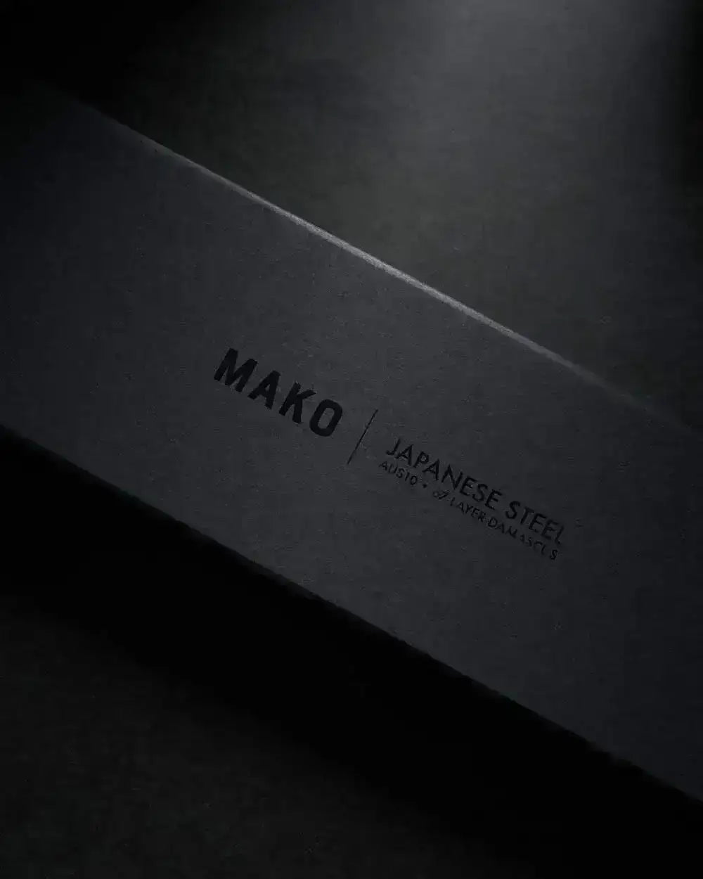 Black rectangular box with MAKO Japanese steel 67 layer Damascus branding, premium knife packaging