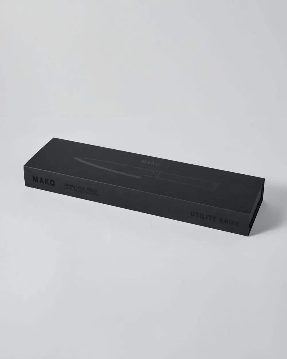 Mako Japanese steel utility knife packaging in sleek black box designed by Marion Grasby