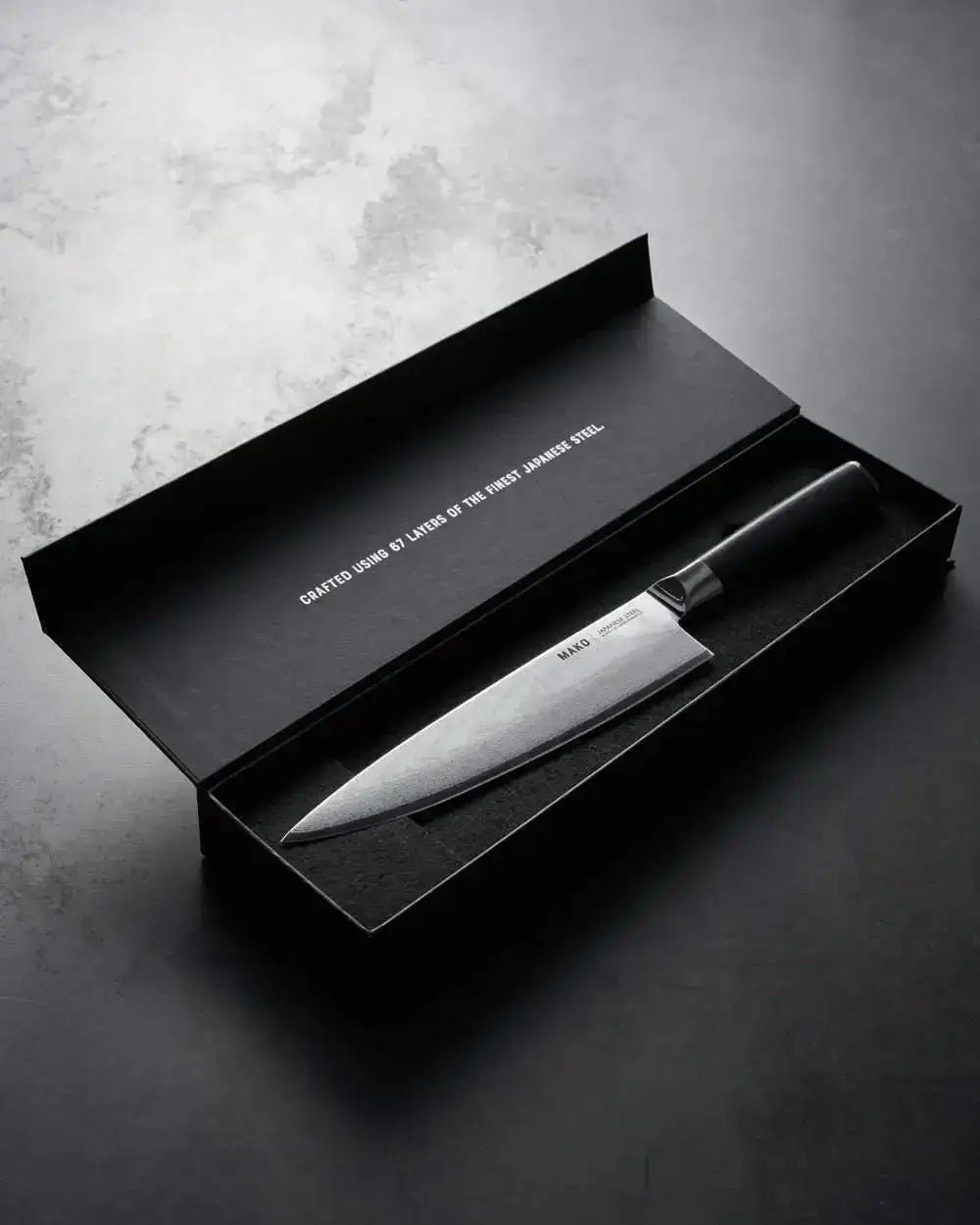 Mako Japanese steel chef knife in black gift box highlighting 67-layer craftsmanship by Marion Grasby