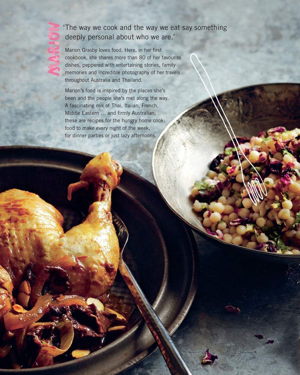 Marion Grasby's cookbook page with roasted chicken dish and pearl couscous salad on rustic metal plates